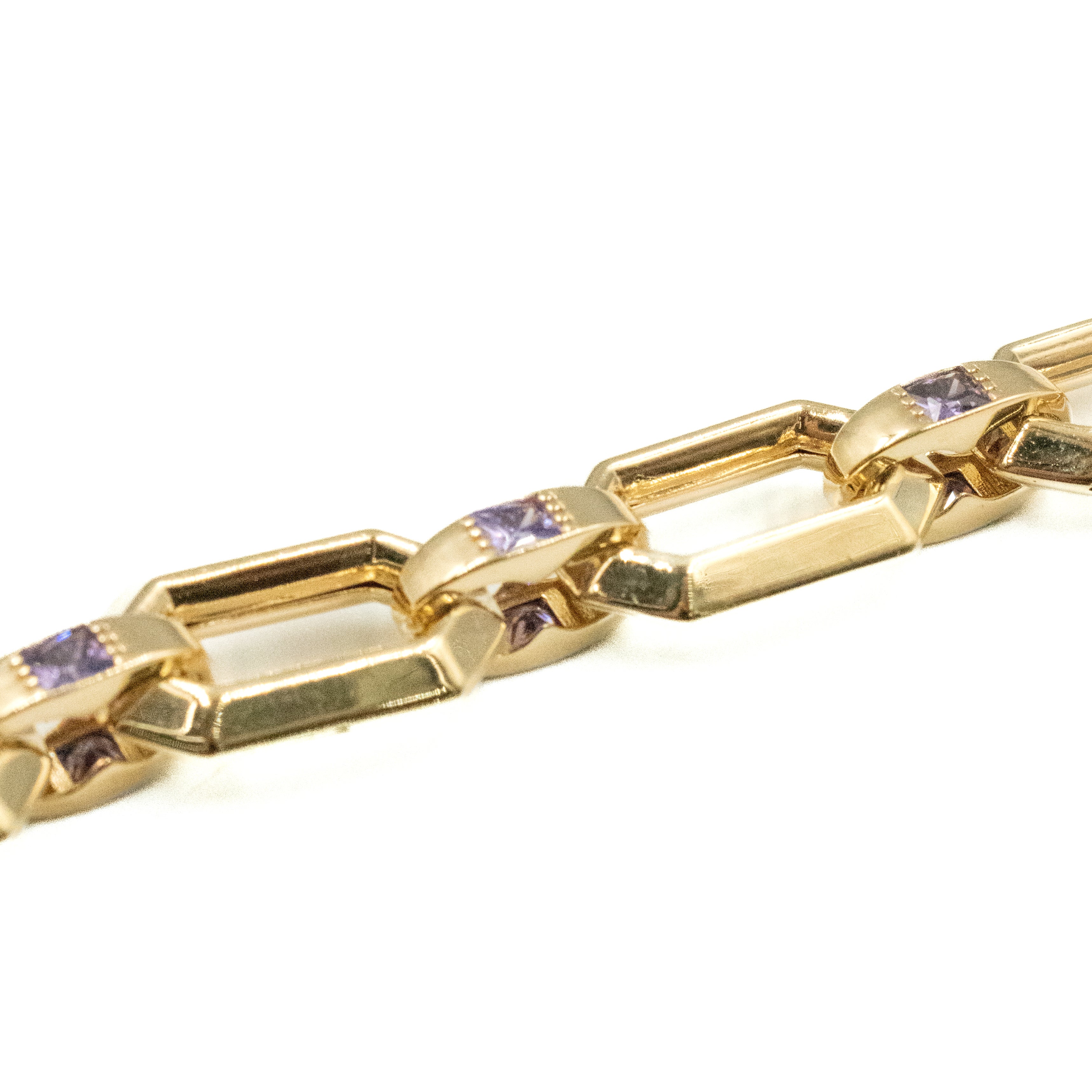 PULSERA CON PIEDRAS ZIRCONIAS MORADAS ORO 14K