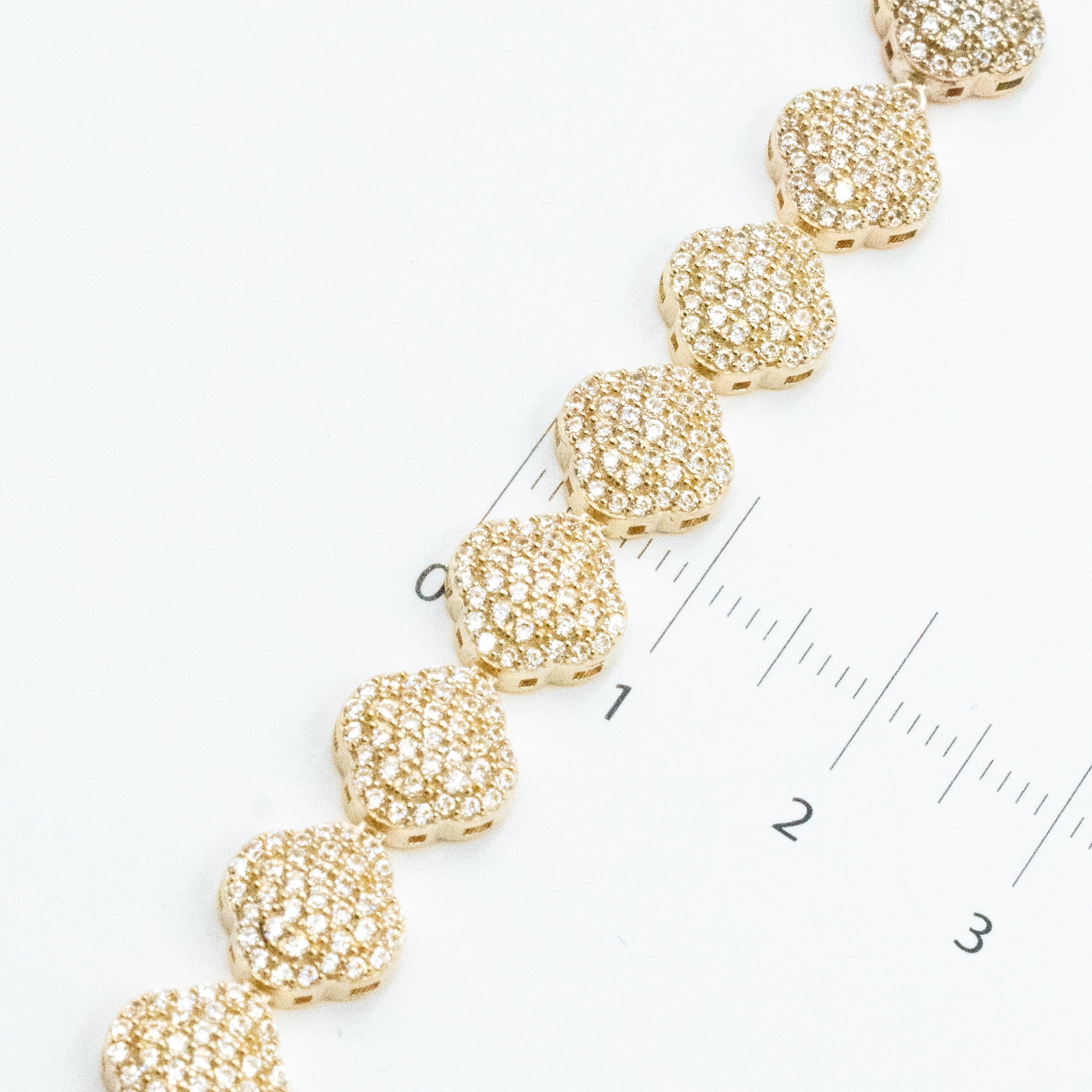 PULSERA DE TREBOL CON PIEDRAS ZIRCONIAS ORO 14K