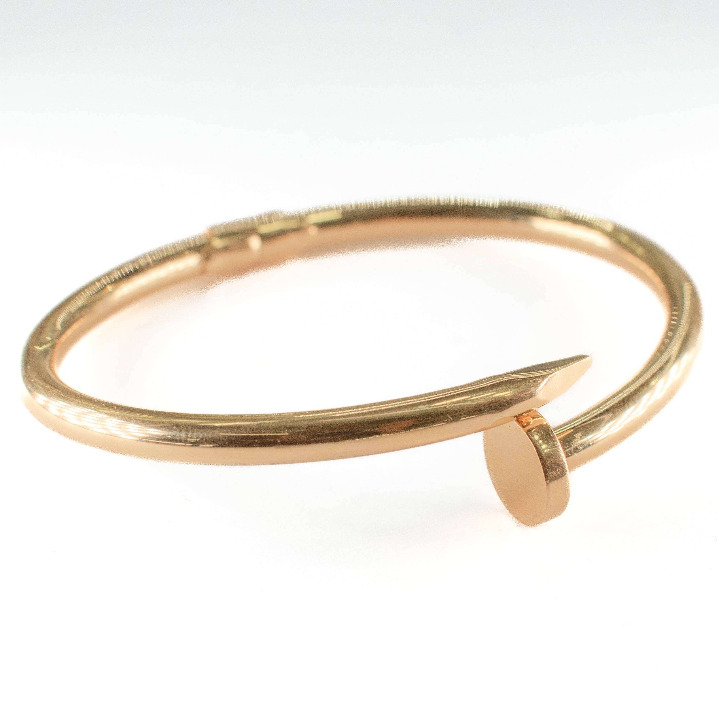 ARO CLAVO HUECA MARCA DE DISEÑADOR ORO 14K