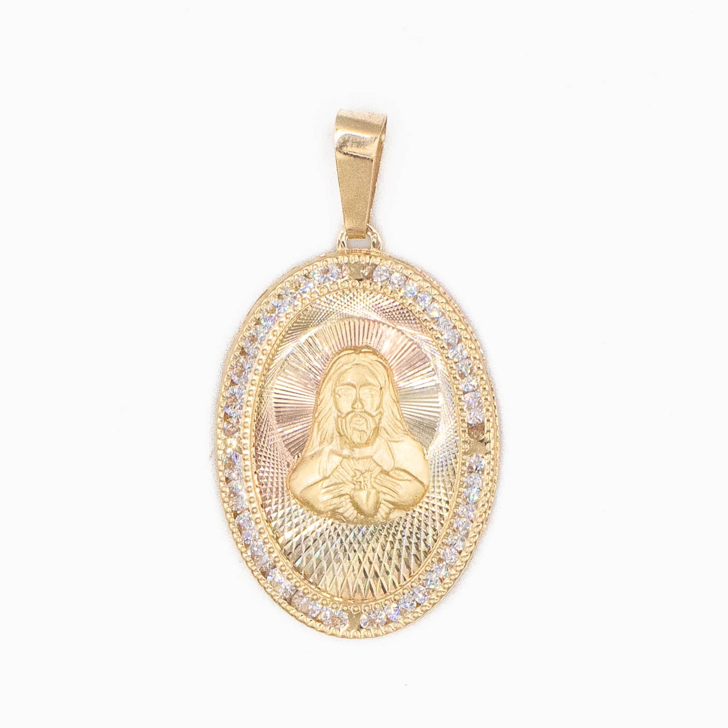 MEDALLA OVALO PIEDRA ZIRCONIA DE SAGRADO CORAZON HUECO ORO 14K